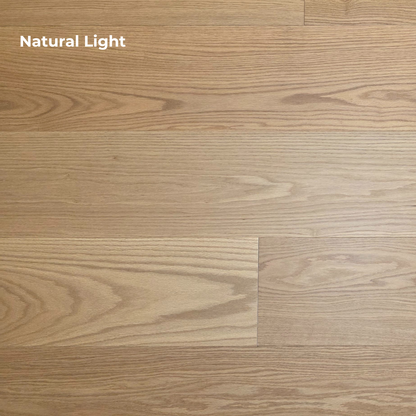 9 1/2" x 5/8" Engineered White Oak Wren Hardwood Flooring shown in Natural lighting. 