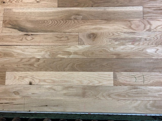 Unfinished White Oak #1 Common Solid Hardwood Flooring. Closeup.