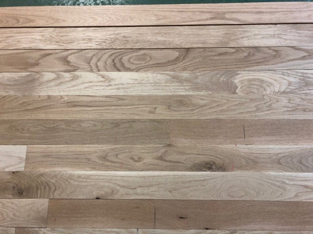 Unfinished White Oak #1 Common Solid Hardwood Flooring. Closeup.